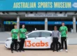 13cabs driver and players in front of 13cabs car