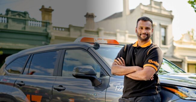 driver 13cabs driver leaning on his car